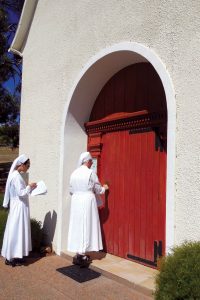 Sisters of the Schoenstatt Shrine in Mt Richon, WA, open the Holy Door to their Church on 13 December 2015. Photo: Supplied