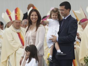 The family which presented the offertory gifts to Pope Benedict XVI at the closing Mass of the World Meeting of Families in Milan.