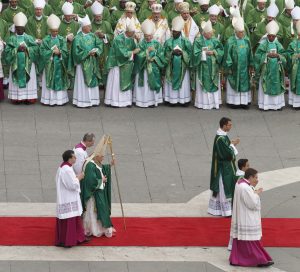 Pope Benedict XVI carries his pastoral staff as he leaves after celebrating the opening Mass of the Synod of Bishops on the new evangelization in St. Peter's Square at the Vatican Oct. 7.