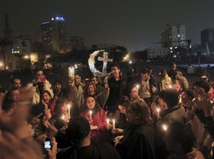 Egyptian Muslims and Christians celebrate Coptic Christmas Eve in Cairo’s Tahrir Square on January 6. PHOTO: Mohamed Abd El Ghany, Reuters