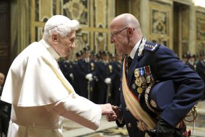 Pope Benedict XVI greets Domenico Giani, the Vatican police chief, during a private audience at the Vatican on January 11. PHOTO: CNS/L’Osservatore Romano