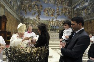 Pope Benedict XVI baptises a baby during a Mass in the Sistine Chapel at the Vatican on January 13. The Pope baptised 20 babies as he celebrated the feast of the Baptism of the Lord. The Pontiff told parents that baptism would bring their child into a “personal relationship with Jesus” that would give their lives meaning. PHOTO: CNS/L’Osservatore Romano