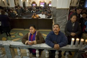 People pray during an Ash Wednesday service at Our Lady of Guadalupe Cathedral in Tijuana, Mexico, Feb. 13. Many Latin Americans say that, more important than seeing one of their cardinals become pope, is having a pope that understands the region. PHOTO: CNS/David Maung