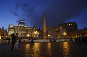 People stroll through St. Peter's Square at the Vatican Feb. 26, the eve of Pope Benedict XVI's final weekly audience. PHOTO: CNS/Paul Haring