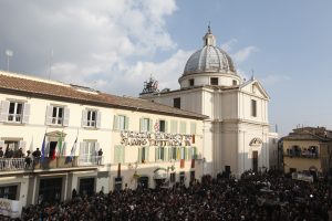 People gather in the town square of Castel Gandolfo for Pope Benedict XVI's final public appearance on Feb. 28 as pope. PHOTO: CNS/Paul Haring People gather in the town square of Castel Gandolfo for Pope Benedict XVI's final public appearance on Feb. 28 as pope. PHOTO: CNS/Paul Haring