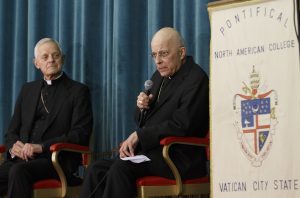 Cardinal Francis E. George of Chicago speaks as Cardinal Donald W. Wuerl of Washington looks on during a press conference at the Pontifical North American College in Rome March 4. The U.S. cardinals spoke after attending the first general congregation meeting of the world's cardinals at the Vatican. PHOTO: CNS/Paul Haring