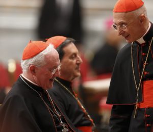Canadian Cardinal Marc Ouellet, prefect of the Congregation for Bishops, left, Cardinal Ruben Salazar Gomez of Bogota, Colombia, center, and Italian Cardinal Angelo Bagnasco of Genoa, right, are seen before a prayer service with eucharistic adoration in St. Peter's Basilica on March 6 at the Vatican. PHOTO: CNS/Paul Haring Canadian Cardinal Marc Ouellet, prefect of the Congregation for Bishops, left, Cardinal Ruben Salazar Gomez of Bogota, Colombia, center, and Italian Cardinal Angelo Bagnasco of Genoa, right, are seen before a prayer service with eucharistic adoration in St. Peter's Basilica on March 6 at the Vatican. PHOTO: CNS/Paul Haring