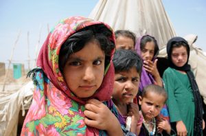 Afghan children are seen in late May at a temporary shelter in an internally displaced person’s camp on the outskirts of Balkh province, Afghanistan. PHOTO: CNS/Sayed Mustafa, EPA