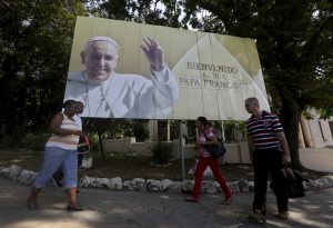 Cubans walk under a Pope Francis billboard in Havana, Sept. 14, 2015. Pope Francis' 10th foreign trip will be the longest of his pontificate and, with stops in Cuba, three U.S. cities and the United Nations, it also will be a "very complex trip," the papal spokesman said. PHOTO: CNS/Enrique de la Osa, Reuters Cubans walk under a Pope Francis billboard in Havana, Sept. 14, 2015. Pope Francis' 10th foreign trip will be the longest of his pontificate and, with stops in Cuba, three U.S. cities and the United Nations, it also will be a "very complex trip," the papal spokesman said. PHOTO: CNS/Enrique de la Osa, Reuters