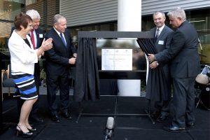 WA Premier Colin Barnett unveils the plaque at the opening of the new St John of God Midland Public Hospital. St John of God Health Care Group Chief Executive Officer, Dr Michael Stanford, stands far left. Photo: Supplied