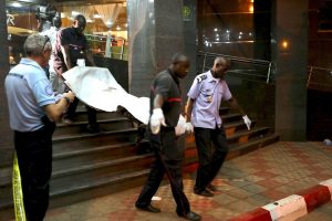 Officials carry a body outside the Radisson Hotel in Bamako, Mali, on 20 November. At least 22 people were killed that day when gunmen raided the hotel and held 170 people hostage. Photo: CNS. Officials carry a body outside the Radisson Hotel in Bamako, Mali, on 20 November. At least 22 people were killed that day when gunmen raided the hotel and held 170 people hostage. Photo: CNS.