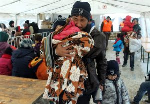 Migrants from Syria, Iraq and Afghanistan arrive at the transit and registration camp in the town of Presevo, southern Serbia on November 24. Archdiocese of Perth Manager for Social Services Development Renay Grech this week told The eRecord that he is continuing to take calls from members of the Catholic community who are looking to provide assistance to refugees who are scheduled to arrive in Australia soon. Photo: CNS/Djordje Savic.