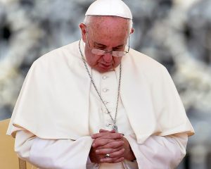 Pope Francis prays during his Aug. 26 general audience in St. Peter's Square at the Vatican. Pope Francis says he wants the Year of Mercy to usher in a "revolution of tenderness." (CNS photo/Ettore Ferrari, EPA) See VATICAN-LETTER-POPE-MERCY Dec. 3, 2015.