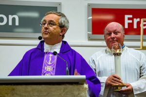 Fr Nino Vinciguerra speaks at the Identitywa and Personal Advocacy Service annual Mass. He is assisted by Danny Wilkie, who has significantly benefited from Identitywa’s services. Photo: Supplied Fr Nino Vinciguerra speaks at the Identitywa and Personal Advocacy Service annual Mass. He is assisted by Danny Wilkie, who has significantly benefited from Identitywa’s services. Photo: Supplied