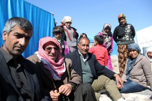 Syrian refugees are seen in 2015 at a makeshift camp in Adana, Turkey. Photo: CNS /Nathalie Ritzmann.