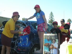 Year Five students from St Munchin’s Catholic Primary in Gosnells organised a car wash to raise money for people less fortunate with Caritas Australia. PHOTO: Supplied