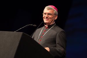 Perth Archbishop Timothy Costelloe addresses some 3,000 youth at the 2015 Australian Catholic Youth Festival. Photo: Daniel Hopper/ACBC.