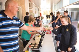 High school chaplain Phil Glossop assists at a morning ‘Breakfast Club’. Such activities are all a part of the diverse range of work chaplains do in school communities around Australia. PHOTO: YOUTHCARE