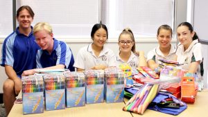 Generous Mercedes College, Santa Maria College and Trinity College students have donated their time and money during the summer holidays to help ensure that children in the care of not-for-profit organisation MercyCare have the best start to the school year. Photo: Supplied