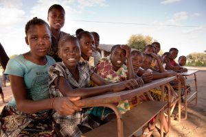 Beaming children from the village of Matuba in Mozambique, where many are orphans supported by Caritas Australia through Project Compassion.