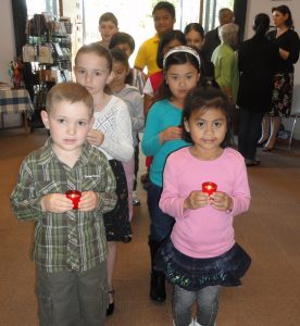 Children at St Emilie’s in Canning Vale lead their community in seeking Mary’s prayer.