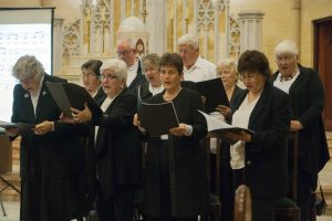 Dr Victoria Rogers holds an album of pieces performed by WA pianist Eileen Joyce. Photo: Caroline Smith