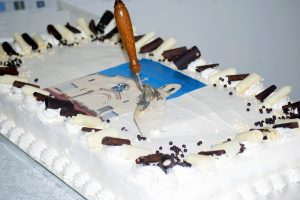 The ceremonial cake was cut using an inscribed silver trowel, which was donated by the architect of St Columba Church, Edgar Le B Henderson, 80 years ago. Photo: Rachel Curry