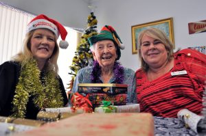 Lee-Anne Broadbent (right) is just one of the dedicated care staff who will forfeit Christmas day to help care for the dozens of residents at local aged care home Mercy in Edgewater. Photo: Supplied