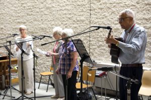 Musicians perform hymns during Mass at St Denis Church in Joondanna on Thursday, 19 January. Photo: Rachel Curry