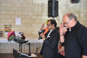 Fr Anand leads the gathering in prayer at a luncheon gathering at the Fr Dan Foley Centre in Lockridge. PHOTO: Supplied