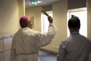 Perth Archbishop Timothy Costelloe blesses the new Office of the Archbishop and Archdiocesan Administration Centre – known as Griver House – on Thursday, 8 December 2016. Photo: Jamie O’Brien