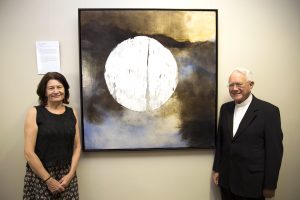 Artist Camilla Loveridge officially hands over ownership of her Mandoorla Art Award winning painting, entitled Over Jerusalem, to St Mary’s Cathedral Dean, Msgr Michael Keating. Photo: Jamie O’Brien