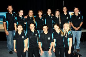 Kolbe Catholic College staff and students, who are preparing to travel to Flores in Indonesia to visit poverty-stricken villages, celebrate the success of their fundraising Quiz Night. Photo: Supplied