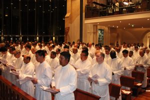 148 men step forward to be installed as acolytes.