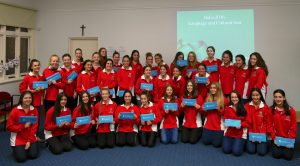 The students from Mercedes College’s Italian Language and Culture group hold the tickets of the Italian tour which brought them to experience Mass with Pope Francis on 3 April 2016. Photo: Supplied