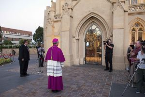 Archbishop Timothy Costelloe prepares to enter the Holy Door at his installation Mass on 21 March 2012. Archbishop Costelloe will this month celebrate the commencement of the Jubilee Year of Mercy with the opening of the Holy Door at St Mary’s Cathedral on December 12. Photo: Ron Tan.