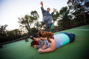 Friar Gabriel Cortes goes airborne with his skateboard over participants at the Catholic Youth Ministry retreat at Eagles Nest on October 5-7. PHOTO: Michael Connelly