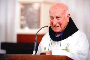 Father Michael Brown (right) was close to his family, including his six siblings. He is pictured with his brother Neil Brown and sister-in-law Margaret Brown in Hong Kong in 1987. Photo: Supplied