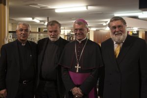 Fr Joe Pelle from Redemptoris Mater Seminary, with Seminary Rector Fr Michael Moore, Perth Archbishop Timothy Costelloe, centre, and Perth Hebrew Congregation Chief Rabbi David Freilich. Photo: Marco Ceccarelli