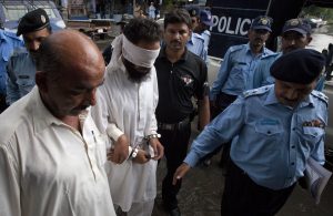 Police escort blindfolded Muslim cleric Khalid Jadoon Chishti as he is taken into court in Islamabad on September 2. Pakistani authorities arrested the imam on suspicion of framing Rimsha Masih, a Pakistani Christian girl accused of blasphemy. Police escort blindfolded Muslim cleric Khalid Jadoon Chishti as he is taken into court in Islamabad on September 2. Pakistani authorities arrested the imam on suspicion of framing Rimsha Masih, a Pakistani Christian girl accused of blasphemy.