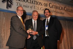 UNDA Vice-Chancellor Emeritus Dr Peter Tannock receiving the Rev Theodore M Hesburgh CSC Award in Washington DC earlier this month. PHOTO: UNDA