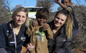 Notre Dame students Melanie Zaharopoulos and Porschia Dickey took part in the Tjuntjuntjara immersion program through the School of Education. PHOTO: Supplied