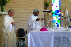 Archbishop Timothy Costelloe recently visited the newly restored Our Lady Help of Christians Church in Karlgarin three years after a devastating storm crippled the building. He is pictured with Parish Priest Father Sebastian Fernando cutting the cake to celebrate the 50th anniversary of the Church. Photo: Supplied