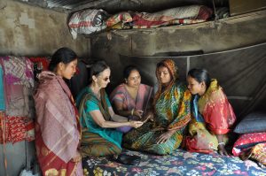 Pronoti, a Safe Motherhood Project trainer midwife, and the program’s co-ordinator, Sr Julienne, reinforce training to midwives on ways of checking for jaundice. PHOTO: Caritas/Majed Chowdhury