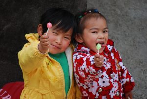 Zuo Liu and Tan Chen Dan, cared for By Casa Ricci Social Services in Hongjiang, southeastern China, as photographed by The Record in 2009. Although the Hongjiang centre the children were being cared for has been unaffected, others run by CRSS caring for children suffering from HIV-AIDS have been disrupted. Photo: Robert Hiini