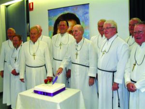 Br Redmond Casey, third from left, joins fellow Marist Marius Woulf as Br Woulf celebrates his 80th birthday in Darwin this year. PHOTO: supplied