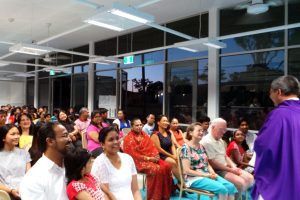 Banksia Grove Parish Priest, Father Vinh Dong, celebrates Mass as part of the Misa de Gallo – a Filipino Advent tradition of nine Masses held before Christmas. Photo: Supplied