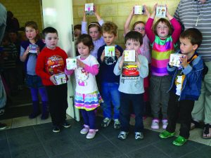 Children from Newman College (Kindergarten) get ready to give gifts to Floreat seniors. PHOTO: Floreat Parish