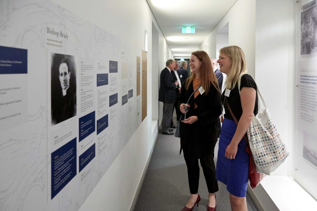 Guests at the opening of the new museum under the Cathedral admire the permanent displays. Photo: Ron Tan.