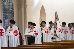 The entrance procession by members of the Holy Sepulchre of Jerusalem order for the investiture ceremony took place before mass at St Mary’s Cathedral on 15 September. Photo: Amanda Murthy.